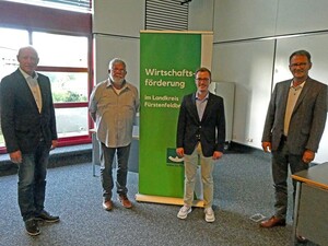 Foto: AUsscheidende und neue Mitglieder im Wirtschaftsbeirat