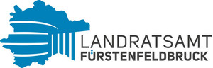 Neues Logo: Blauer Umriss des Landratsamtgebäudes mit Schriftzug Landratsamt Fürstenfeldbruck